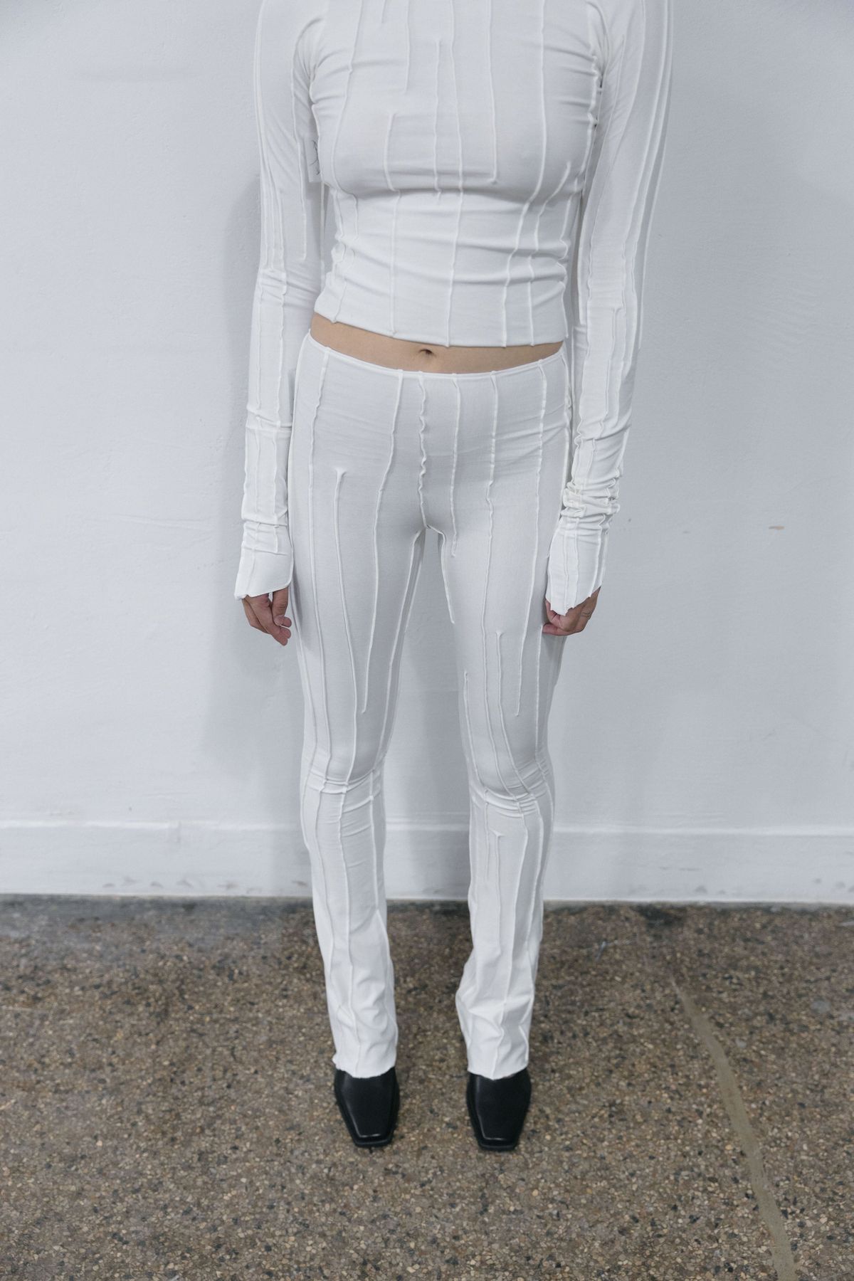 OFF-WHITE ASYMMETRIC FULL SUTURE FLARE PANTS - S/M fits a M-XL