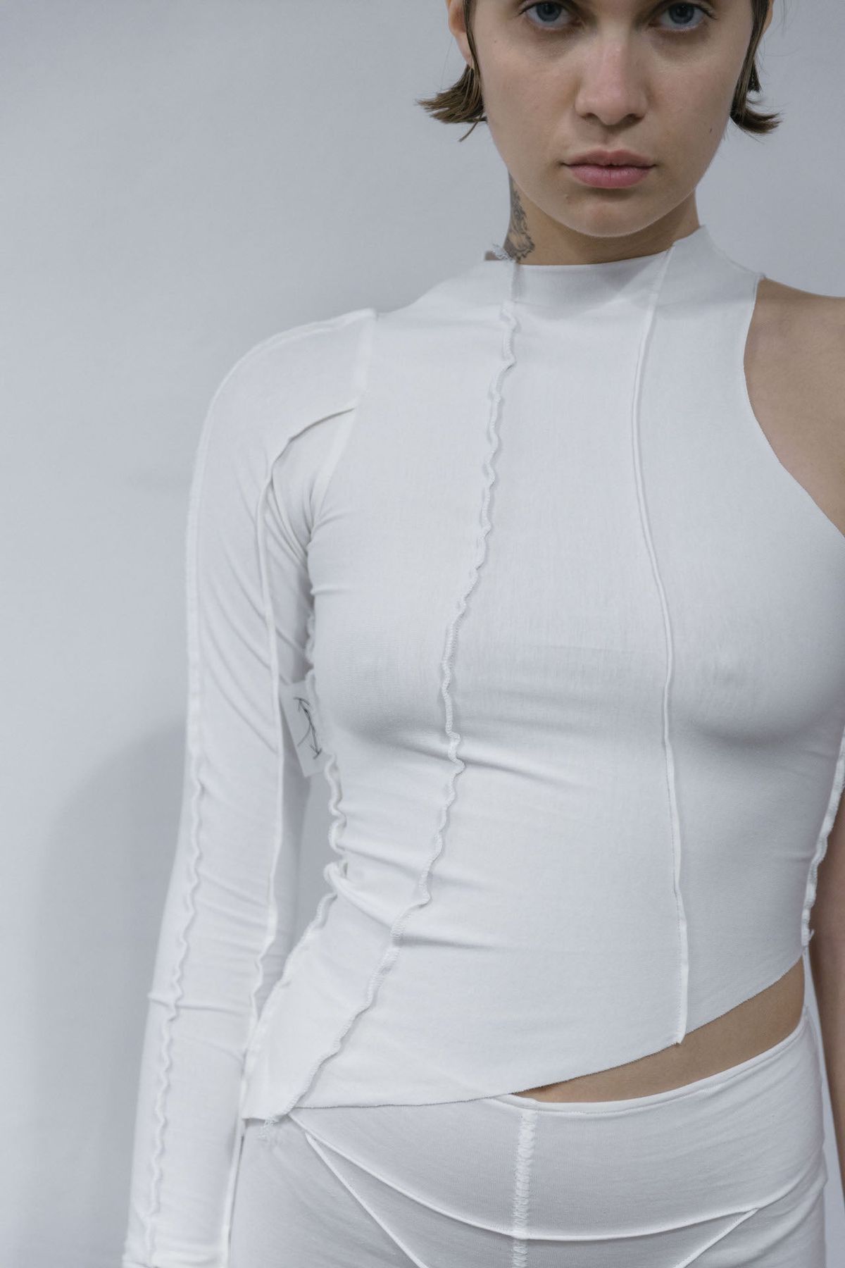 OFF WHITE ONE SLEEVE ASYMMETRIC OPEN SEAM TOP - XS/S