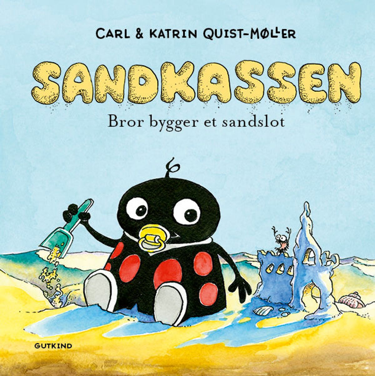 Sandkassen. Bror bygger et sandslot